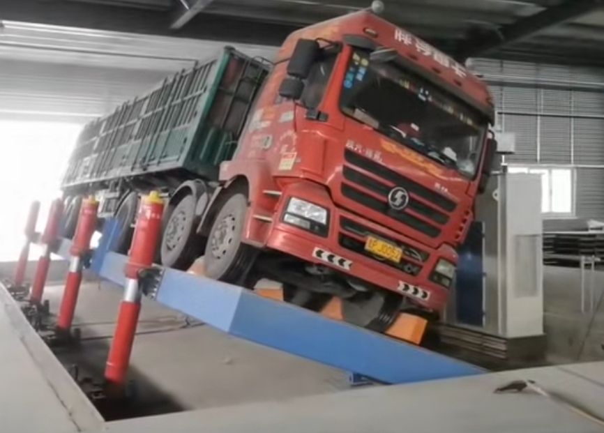 液壓翻板卸車機(jī)、糧食散料車輛卸車裝置