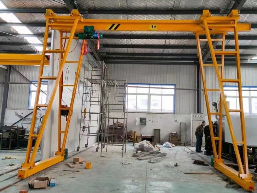 龍門吊廠家生產(chǎn)，手推型/電動型小型門式起重機制造安裝調(diào)試
