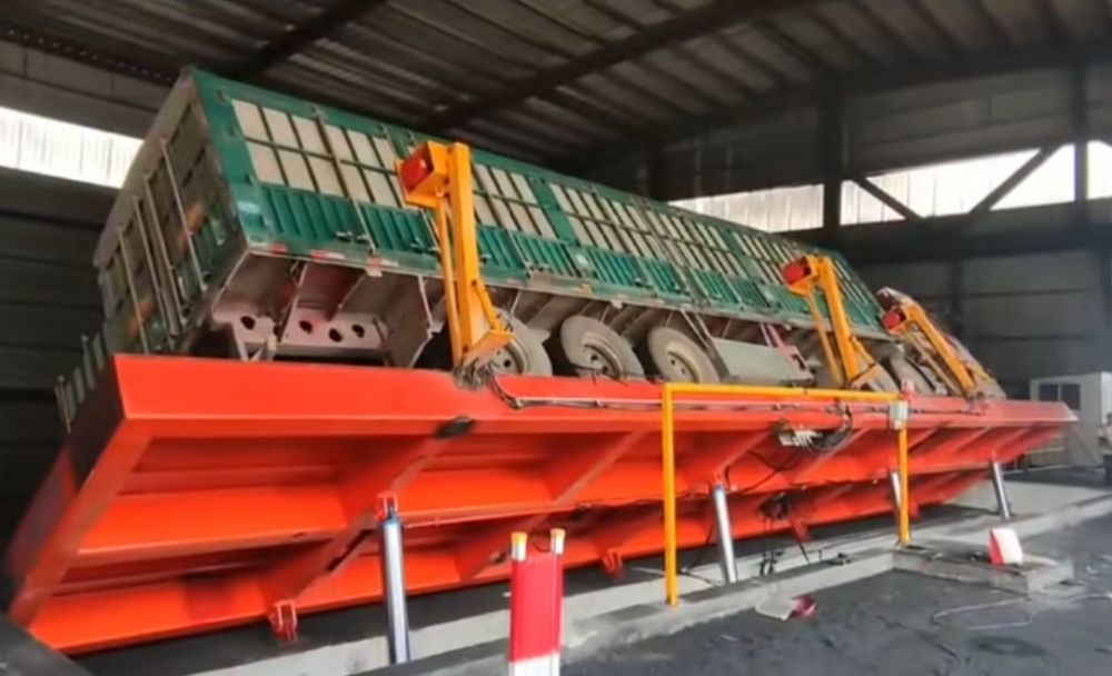 液壓翻板卸車機(jī)、糧食散料車輛卸車裝置