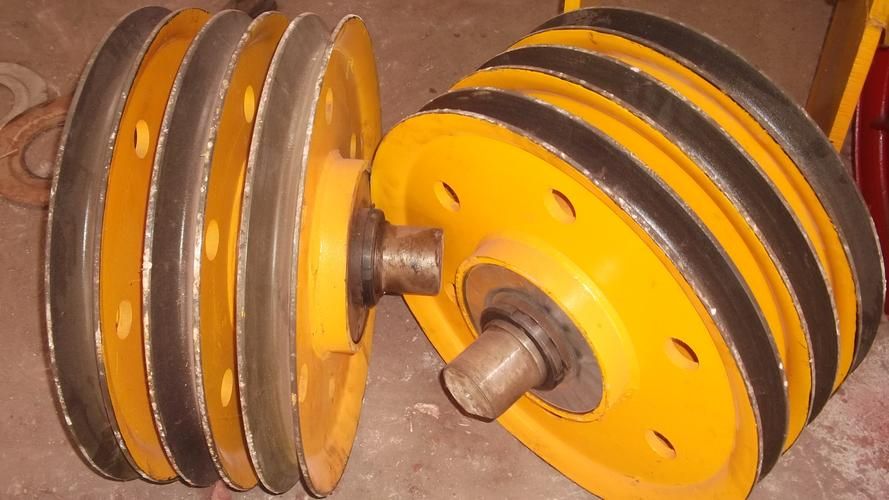 動滑輪和定滑輪在起重機(jī)滑輪組中各有什么作用